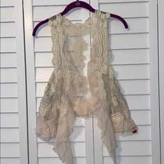 Nwt Virtuosa Collections Sleeveless Lace Vest. Cream Color. Great With Your Favorite Pair Of Jeans. Size M/L. Fitted Vest For Summer Layering, Bohemian Summer Vest For Layering, White Sleeveless Spring Vest, Fitted Sleeveless Vest For Vacation, White Sleeveless Vest For Spring, Beige Sleeveless Vest For Beach, Chic Sleeveless Lace Tank Top, Bohemian Fitted Tank Top For Spring, Fitted Bohemian Tank Top For Spring