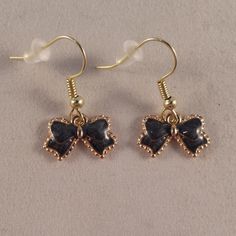 These Pearl Black Bow Dangle Earrings Are Gold Plated, Hand Painted, And On Hypoallergenic Hooks That Won't Hurt Your Ears. They Are Brand New, Handmade And Have Never Been Worn. Lead And Nickel Free. Rubber Backs Included. These Fine Quality Earrings Are Perfect And Comfortable For All Day, Everyday Wear, Special Occasions, Or A Special Gift. Get An $18 Gift Of Your Choice In My Listings With Purchase Of Two Or More Items. Please Send Offers And Questions. Cute Black Hypoallergenic Jewelry, Cute Black Dangle Jewelry, Nickel-free Black Earrings For Party, Black Nickel-free Earrings For Party, Black Hypoallergenic Jewelry For Party, Cute Black Earrings As A Gift, Cute Black Earrings For A Gift, Cute Black Earrings For Gift, Cute Black Jewelry For Party