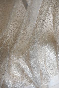 Beautiful sparkle Tulle with Gold Glitter Soft Tulle hand feel This is a new style in high quality. Great for wedding dress, evening gown, Costume, cocktail dress, flower girl dress This Listing is sell for fabric, not include the dresses Color: Ivory with Gold Glitter, Ivory with Silver Glitter Width - 51 inches, Length - 1 Yard Wholesale acceptable, please convo me Shipping Time: United Sates: 10-15 working days United Kingdom:10-15 working days Canada: 10-15working days Australia: 10-15 worki Gold Sequin Fabric, Wedding Dress Evening, Fabric Glitter, Bridal Wedding Dress, Bridal Fabric, Gold Champagne, Shiny Fabric, Glitter Wedding, Glitter Gold