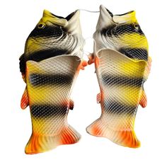 two fish shaped like they are facing each other