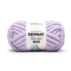 the yarn ball is purple and has a white label on it that says bernat blanket big