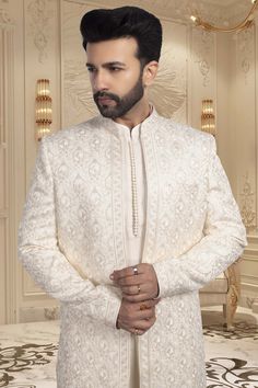 Exude sophisticated elegance and stand out on your special day with this open jacket sherwani. Designed for the modern groom who appreciates simplicity, this R14-S56 style is the perfect blend of tradition and contemporary. Make a statement and feel exclusive with this mens sherwani. Open Jacket Sherwani, Modern Groom, Mens Sherwani, Open Jacket, Sherwani, Your Special, Special Day, The Modern