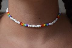 Cute, Rainbow choker to give you the best summer vibes! Summer Choker Necklace, Casual Rainbow Jewelry For Festivals, Trendy White Beads For Festival, Casual Beaded Chain Bracelets For Summer, Trendy White Festival Beads, Adjustable Rainbow Necklace For Summer, Summer Adjustable Rainbow Necklace, Casual Festival Jewelry With Tiny Beads, Summer Casual Beads As Gifts