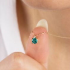 "Our single diamond tiny round aqua green necklace is an elegant jewel to wear whenever you want. A nice gift for your loved ones and yourself. 🤍🤍 Special gifts for your special moments. We produce our jewelery for you in the most perfect way. 🤍🤍 All of our products are carefully crafted from 14K Solid Gold and Real Diamonds. FEATURES * Made to order. * Gold Color Selection: Yellow Gold, Rose Gold, White Gold * Gold KT: 14K * Length: 14\", 16\", 18\", 20\", 22\",24\" * Gemstone: Genuine Diam Dainty Diamond Jewelry For May Birthstone, Dainty 14k Gold Emerald Necklace, Dainty 14k Gold Emerald Necklace For Anniversary, Fine Jewelry Diamond Necklace For May Birthstone, Diamond Accents Necklace For May Birthstone Gift, Diamond Necklace With Accents For May Birthstone Gift, May Birthstone Diamond Necklace With Accents As Gift, May Birthstone Diamond Necklace With Diamond Accents, May Birthstone Jewelry Gift With Single Diamond