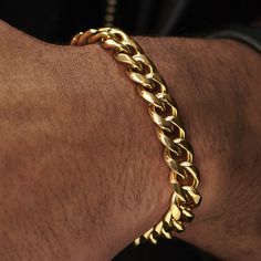 * Gold-toned stainless steel construction
 * Simple yet strong lobster claw clasp Stainless Steel Cuban Link Bracelet With Chunky Chain, Classic Gold Chunky Jewelry, Classic Chunky Gold Jewelry, Classic Cuban Link Bracelet With Chunky Chain For Everyday, Chunky Cuban Link Bracelet In Stainless Steel, Gold Chunky Chain Stainless Steel Bracelet, Gold Stainless Steel Chunky Chain Bracelet, Gold Metal Cuban Link Bracelet, Gold Chain Cuban Link Metal Bracelet