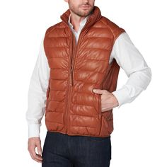 Keep warm all season long. For everyday wear and cold-weather warmth, our ribbed leather puffer vest is crafted from the finest materials. With a classic design and quality crafted for insulation, the Lucchese men’s puffer vest will last generations. Note: Fits small - recommend ordering a size up - Clean professionally Model is 6'1 and wearing size M. Leather Puffer Vest, Leather Puffer, Handcrafted Boots, Handmade Boot, Vests Mens, Puffer Vest, Keep Warm, Leather Men, Cold Weather