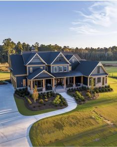 an aerial view of a large house in the country