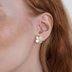 These beautiful earrings were inspired by the delicate bloom of a spring flower. Sweet, gentle, and always beautiful, they remind us to slow down and enjoy every moment. Feminine Blossom Earrings For Gift, Delicate Birth Flower Earrings For Anniversary, Elegant Birth Flower Earrings, Delicate Birth Flower Earrings, Feminine Flower Shaped Earrings For Gift, Delicate Rose Gold Birth Flower Earrings, Elegant Spring Jewelry With Birth Flower Details, Elegant Spring Birth Flower Jewelry, Delicate Petal Shaped Flower Earrings As Gift