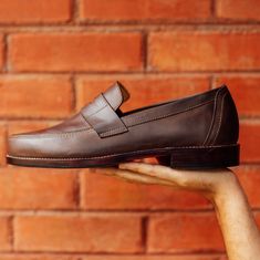 Men's Handcrafted Leather Penny Loafers | The Luca – Adelante Shoe Co. Masculine Business Casual Moccasins With Rubber Sole, Masculine Leather Sole Moccasins For Business Casual, Business Casual Moc Toe Loafers With Goodyear Welt Construction, Masculine Moc Toe Leather Shoes For Business Casual, Semi-formal Slip-on Dress Shoes With Goodyear Welt, Masculine Business Casual Slip-ons, Semi-formal Moccasins With Goodyear Welt And Plain Toe, Semi-formal Plain Toe Moccasins With Goodyear Welt Construction, Goodyear Welt Wingtip Moccasins For Semi-formal