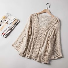 Women's Wholesale New V-neck Lace Hollowed-out Hook Pullover Shirt on Luulla Fall V-neck Blouse With Lace Patchwork, V-neck Lace Patchwork Top For Fall, Lace V-neck Top With Crochet Trim, Cream V-neck Top With Crochet Trim, V-neck Blouse With Lace Patchwork For Fall, Chic Cream V-neck Crochet Top, Summer V-neck Hollow Out Top, Summer Crochet Lace V-neck Top, V-neck Lace Tops With Lace Patchwork