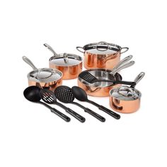 an assortment of pots and pans on a white background