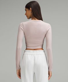 Hold Tight Straight-Hem Cropped Long-Sleeve Shirt | Women's Long Sleeve Shirts | lululemon Fitted Long Sleeve Athleisure Top With Thumbholes, Fitted Long Sleeve Top With Thumbholes For Athleisure, Fitted Long Sleeve Casual Tops, Athleisure Fitted Long Sleeve Tops, Fitted Lululemon Tops With Thumbholes, Stretchy Lululemon Crew Neck Top, Versatile Lululemon Tops For Fall, Versatile Lululemon Tops, Lululemon Stretch Crew Neck Top