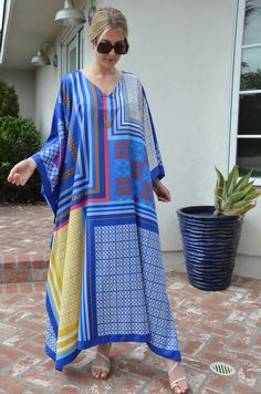 Gorgeous mixture of beautiful colors and a whimsical patterns gives a light, casual feel to this silk caftan. Beautiful for a summer day at the pool, beach or that special vacation. One size. Fits medium to X-large sizes. The width is 53 inches, 106 around the body. The length is 53 inches. Multicolor Silk Printed Tunic, Bohemian Silk Multicolor Print Dress, Bohemian Silk Dress With Multicolor Print, Bohemian Multicolor Print Silk Dress, Patterned Silk Kaftan For Spring, Silk Patterned Kaftan For Spring, Spring Silk Patterned Kaftan, Summer Silk Patterned Kaftan, Casual Multicolor Silk Maxi Dress