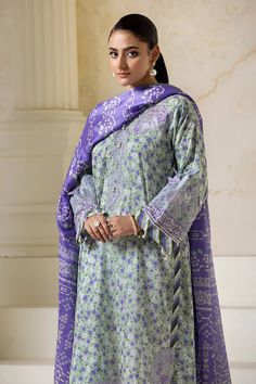 PRODUCT DETAILS SHIRT Printed Lawn Shirt Embroidered Left & Right Panel Embroidered Organza Neckline Embroidered Front Daman Embroidered Sleeves Embroidered Sleeves Lace TROUSER Dyed Lawn Trouser DUPATTA Printed Silk Dupatta COLOR Pastel Green ATTRIBUTEChasing petals and a symphony of summer KSE-2727 heavy embroidered Suit with printed silk dupatta is perfect for your wardrobe. Purple Cotton Lawn Suit With Printed Motifs, Fitted Unstitched Suit With Embroidered Border And Long Sleeves, Green Cambric Sets With Floral Embroidery, Spring Cotton Lawn Suit With Embroidered Border, Embroidered Cotton Purple Sets, Fitted Long Sleeve Lawn Suit With Embroidered Border, Embroidered Purple Cotton Sets, Purple Embroidered Cotton Sets, Purple Long Sleeve Sets With Printed Motifs