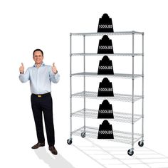 a man standing in front of a four tiered rack with five feet on each shelf