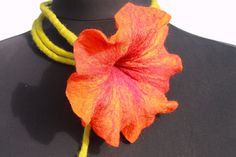 A very beautiful felted orange blossom with bourdauxfarbenen gradient as Filzkette. You can view the chain around his neck wear, but also as an ornament around the waist. Super well as the special jewelry for the bride. Very refined affects the flower necklace as a bracelet. Your imagination knows no bounds. The flower is orange with yellow gradient and the long stem is light green. The colors are beautiful, you'll be amazed. Size / Weight / Dimensions Length of the stem with flower 70,8 inch Fl Wool Necklace, Yellow Gradient, Felt Necklace, Hippie Necklace, Special Jewelry, Chain Jewelry, Blossom Flower, Orange Blossom, Large Flowers