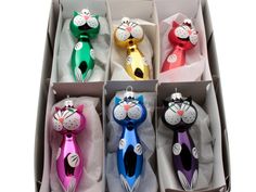 six different colored cat shaped items in a box