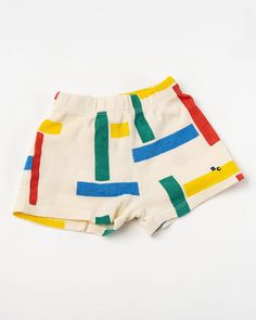 Bobo Choses Kids Multicolor Beacons Shorts. Bobo Choses is a sustainable children’s clothing brand that celebrates kids for their creativity, their spunk, and hopes to inspire kids and adults alike to be funny and lighthearted. At Jake and Jones, a Santa Barbara boutique for slow fashion. Playful Summer Shorts, Casual Graphic Print Shorts For Playwear, Playful Cotton Shorts For Summer, Fun Cotton Beach Shorts, Fun Beach Cotton Shorts, Playful Yellow Summer Shorts, Playful Shorts For Playtime, Cotton Graphic Print Bottoms For Playwear, Cotton Bottoms With Graphic Print For Playwear