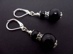 A pair of pretty hand made tibetan silver & black onyx bead dangly leverback hook earrings. new. Gothic Silver Jewelry With Round Beads, Silver Gothic Jewelry With Round Beads, Gothic Dangle Jewelry With Lobster Clasp, Elegant Black Round Bead Earrings, Handmade Black Dangle Earrings, Elegant Handmade Adjustable Earrings, Handmade Black Metal Jewelry, Gothic Hypoallergenic Drop Earrings, Adjustable Gothic Onyx Jewelry