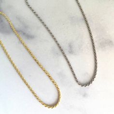 "Super high quality rope chain necklace! Skinny rope chain is perfect for a minimalist look or stacked with other chain necklaces. #1 Trend at the moment! - - D E T A I L S - - ▫︎ Made of 925 Sterling Silver ▫︎ Thick plating of 14k Gold or Rhodium ▫︎ 18\" Chain + 3\" Extension Chain ▫︎ 2\" Thickness ▫︎ Lobster-clasp closure Necklaces on Model: https://www.etsy.com/listing/922116533/small-paperclip-necklace-chain-necklace?ga_search_query=paperclip%2Bnecklace&ref=shop_items_search_1&pro=1 Silver Link Rope Chain Necklace Gift, Gift Twisted Rope Chain Necklace, Rope Chain Necklace For Everyday, Everyday Rope Chain Necklace, Dainty Rope Chain Necklace For Everyday Wear, Dainty Everyday Rope Chain Necklace, Everyday Minimalist Rope Chain Necklace, Rope Chain Gold, Twisted Necklace