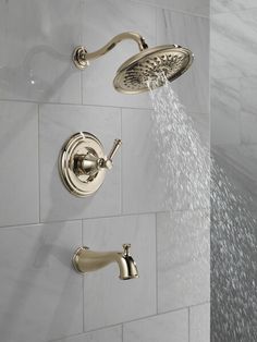 a shower head with water running from it