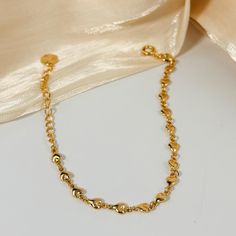 🌻This gold-plated silver bracelet is composed of many small hearts linked together, with a design theme centered around hearts. 🥰This piece is meticulously crafted from S925 sterling silver (total 4.8g，5.9"-7.9") and finished with a luxurious coating of genuine 18k gold plating. 🥰This bracelet is adjustable to fit your desired size. 🥰We will send it in a beautiful jewelry box and package it carefully. We offer boxes in blue, green, white, and black. Please leave a message specifying your pre Gold Heart-shaped Chain Bracelets, Elegant Gold Charm Bracelet With Heart Beads, Gold Elegant Heart Beads Bracelet, Elegant Gold Heart Beads Bracelet, Gold Heart Bracelet With Chain, Silver Heart-shaped Gold-plated Bracelet, Gold Plated Chain Bracelet For Valentine's Day, Silver Heart Shaped Gold Plated Bracelet, Silver Gold Plated Heart Shaped Bracelet