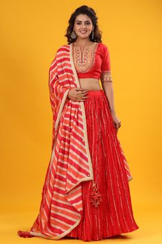 Shop a Red gota patti embroidered set featuring silk dupatta set. It comes with a beautiful striped multicolor embroidered dupatta. Pair it with beautiful jewelry to enhance your look. Shop online from Pure Elegance. Beautiful Lehenga, Pure Elegance, Fashion Journals, Embroidered Dupatta, Dupatta Set, Traditional Fabric, Silk Dupatta, Indian Designer, Indian Designer Wear