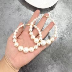 [MATERIAL]: faux pearls, needles are surgical steel and hypoallergenic. [HOOP SIZE]: 80mm Pearl Hoop Earrings Gold, Pearl White Hoop Earrings, Hoop Earrings With Pearl Chain, White Hoop Earrings With Pearl Chain, Trendy White Hoop Pearl Earrings, Pearl Chain Hoop Earrings, Pearl Earrings Outfit, Vestidos Sport, Hoop Earrings Aesthetic