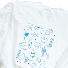 Get ready for a wild west summer with our Coastal Cowgirl Beach Club sweatshirt. Its trendy cowboy aesthetic is perfect for beach lovers and ocean enthusiasts alike. Made from a comfy blend of polyester and cotton, this preppy crewneck features a playful seashell and cowboy design on the back. Size up for an oversized fit and hit the beach in style! Fabric: 50% Cotton/50% Polyester Design: Light Blue heat applied direct to film ink Color: White Colors will vary from computer to computer and moni Trendy Beach Sweatshirt For Summer, Trendy Summer Beach Sweatshirt, Trendy Blue Summer Sweatshirt, Trendy Blue Sweatshirt For Summer, Blue Summer Sweatshirt For Vacation, Blue Sweatshirt For Summer Vacation, Blue Graphic Print Summer Sweatshirt, Blue Graphic Print Sweatshirt For Summer, Oversized Crew Sweatshirt For Summer