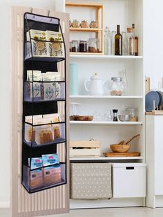 an open refrigerator door showing the shelves with food in it and other items on display