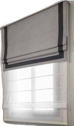 an open window with white curtains and black trim on the bottom curtain, in front of a wall