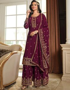 Comfortable dresses that look stylish too? YES PLEASE! Magenta Sharara style Suit Semi-Stitched Suits Buy Now: https://bit.ly/3jRg8qL Apply Code : BTGO-30 buy 2 item get 1 at 30% off #arabicattire #trending #latest #salwaarkameez #islamic #newest #buynow #salwaarsuit #designer #fashion #fashionvlog #kameez #onlineshop #latestdesign2023 #trendingnow Pakistani Sharara, Pakistani Bridal Dress, Modest Evening Dress, Frock Style, Maroon Purple, Georgette Tops, Royal Dresses, Purple Outfits, Pakistani Bridal