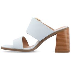 The Junie slip-on heel sandal from Journee Collection is a chic and convenient choice with its 3- inch stacked heel and effortless slip-on design. The multi-strap detailing adds a trendy touch to the open-toe style, creating a versatile and fashionable look. Crafted with faux leather lining, man-made upper and outer sole materials, and featuring a 4 mm Tru Comfort Foam™ footbed, these sandals not only showcase style but also prioritize comfort. Chic Slip-on Block Heels For Spring, Summer Slip-on Heels With Branded Heel Counter, Spring Slip-on Mules With Wooden Heel, Spring Mules With Wooden Heel And Slip-on Fit, Summer Slip-on Heels With Open Heel, Spring Modern Slip-on Heels, Chic Slip-on Heels For Summer, Modern Spring Slip-on Heels, Spring Slip-on Mules With Stacked Heel