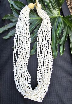 The listing is for 1 lei with 6 strands Nasa shell and  kukui nut on both end. Its length is about 15- 16 inches hanging (32 inches entire strand) If you need more just send me a message and I can do bulk order  100% real shells and kukui nut They are perfect for any hula costumes, weeding accessory, favors, or gift to someone you love. For international Buyer: Please check your country's policies for import duties, taxes and other charges that are nkt included in the item price or shipping charges. These charges are buyer's responsibility and may vary by country. Please be aware to avoid any surprise fee when you receive your package. Thank you for visiting my shop Cheap Festival Shell Strand Necklace, Cheap Bohemian Shell Necklace For Festivals, Hula Costume, Kukui Nut, Bulk Order, Accessories Necklace, Costume Accessories, Lei, Necklace Etsy