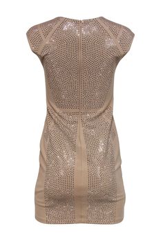 Go sparkling and stunning in this sheath dress from Philipp Plein! Perfect for your next summertime wedding, this is a subtle statement piece to wear with your favorite nude heels. Size M 70% Viscose, 22% Polyester, 8% Elastane Sheath silhouette Rounded neckline All over rhinestones Zippered back Waist 28" Bust 32" Total length 33" Champagne Dress With Rhinestones, Fitted Embellished Beige Mini Dress, Phillips Plein, Summertime Wedding, German Fashion, Buy Shoes Online, Nude Heels, Philipp Plein, Touch Up