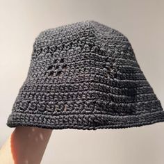 Stay warm and stylish this autumn and winter with this handmade crochet bucket hat, crafted from hollow cotton for a soft and cosy fit. The classic black design makes it a versatile accessory, perfect for cooler weather. With a comfortable head circumference of 54-56 cm, this hat is ideal for everyday wear, whether you're out running errands or adding a fashionable touch to your seasonal wardrobe. The crochet texture provides warmth without bulk, making it a great choice for layering during the Crochet Texture, Cosy Autumn, Cold Weather Hats, Seasonal Wardrobe, Crochet Bucket, Crochet Bucket Hat, Hat For Women, Winter Hats For Women, Black Crochet