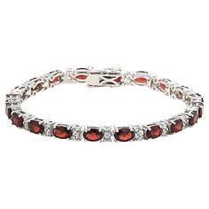 Colleen Lopez Gemstone and White Zircon Tennis Bracelet A testament to timeless elegance and refined taste, this sterling silver tennis bracelet sparkles with oval-cut gemstones and round white zircon.       S/M approx. 6-3/4"L x 1/8"W     M/L approx. 7-1/2"L x 1/8"W     Stamped .925 sterling silver; rhodium plating     Box clasp with double safety catches   Stone Information       All sizes and weights approximate     Total Carat Weight: 12ct (S/M Blue Topaz), 12.8ct (S/M Garnet), 13.2ct (M/L B Classic Oval Cubic Zirconia Bracelets, Oval Tennis Bracelet With Diamond Accents, Formal Oval Gemstone Tennis Bracelet, Classic Oval Gemstone Tennis Bracelet, Oval Cubic Zirconia Tennis Bracelet With Diamond Accents, Oval Tennis Bracelet With Diamond Accents In Cubic Zirconia, Luxury Oval Stone Bracelets, Luxury Oval Bracelets With Stones, Fine Jewelry Tennis Bracelet With Gemstone Accents