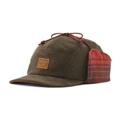 Take warmth to work with the Patagonia Range Earflap Cap  a flannel-lined  mid-crown hat with a denim bill and ear coverings that can be flipped down or tied up as conditions change. Patagonia Hat, Crown Cap, Crown Hat, Winter Hats For Men, Trapper Hats, Cozy Flannel, Casual Hat, Cold Weather Accessories, Dark Walnut