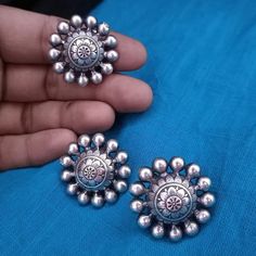 "Oxidized Silver Flower Studs with matching Ring/Silver Stud/Oxidized Silver Stud earring/Ethnic Studs/Traditional Studs/Indian Stud/Tribal Earrings @JhumkaStop Diameter: Earrings: 1.25\" Ring: 1.25\" Earrings come with push Back closure Very Elegant and stylish, these earrings can be paired with any traditional Indian or Western Attire depending upon the occasion and the theme. The base is pure brass (90%) and pure 92.5 silver (10%) which makes this very sturdy and of good quality. 100% guarant Traditional Silver Flower Earrings For Festive Occasions, Traditional Silver Flower Earrings, Traditional Flower Shaped Jewelry, Traditional Flower Earrings For Festive Occasions, Bohemian Flower Earrings For Festive Occasions, Festive Bohemian Flower Earrings, Silver Round Bohemian Flower Earrings, Bohemian Silver Round Flower Earrings, Oxidized Silver Necklace