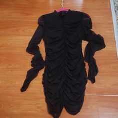 Black Dress From Fashion Nova. Size Xl. It Has A Decent Amount Of Stretch To It. Without Tags, Never Worn. It Is A Sexy, Cute Black Dress. Flirty Black Long Sleeve Dress, Flirty Long Sleeve Black Dress, Sheer Long Sleeve Mini Dress For Going Out, Sheer Long Sleeve Dress For Going Out, Long Sleeve Sheer Dresses For Going Out, Black Stretch Mini Dress With Sheer Sleeves, Black Mini Dress With Sheer Stretch Sleeves, Black Mini Dress With Sheer Sleeves And Bodycon Fit, Black Bodycon Mini Dress With Sheer Sleeves