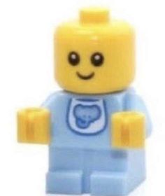 a lego figure with a blue shirt on