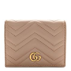 This is an authentic GUCCI Calfskin Matelasse GG Marmont Card Case Wallet in Porcelain Rose. This stylish cardholder is crafted of calfskin leather in beige pink featuring chevron style stitching and an aged gold GG on front. This wallet has card slots, zipper pocket and a bill compartment. Classic Gucci Beige Wallet, Classic Beige Gucci Wallet, Elegant Beige Gucci Wallet, Gucci Beige Wallet, Beige Gucci Wallet For Everyday Use, Gucci Leather Wallet For Everyday Use, Designer Compact Leather Coin Purse, Designer Beige Leather Wallets, Luxury Soft Leather Brown Wallets