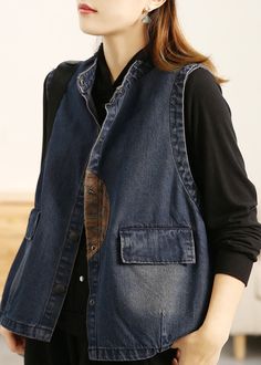 Casual Button-up Vest Outerwear, Casual Sleeveless Denim Vest For Work, Fall Sleeveless Denim Vest With Pockets, Sleeveless Vest With Buttons For Fall, Sleeveless Denim Vest With Buttons For Fall, Spring Sleeveless Vest With Snap Buttons, Casual Denim Sleeveless Vest With Snap Buttons, Blue Button-up Denim Vest With Pockets, Denim Vest With Buttons For Workwear