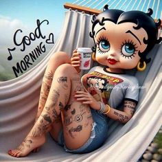 a woman sitting in a hammock with tattoos on her body and holding a drink