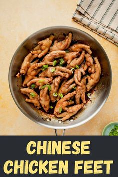 chinese chicken feet in a wok on a table