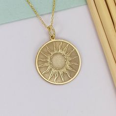 14k Solid Gold Sun Necklace, Engraved Sunshine Pendant, Custom Sunburst Charm Necklace, Dainty Sun Jewelry, Gift For Her  ⬇️ Click for other chain models: ⬇️ https://www.etsy.com/shop/Dzgsilver?ref=seller-platform-mcnav%C2%A7ion_id&section_id=47931970 🟠We produce this product in 2 different materials, 14 carat solid gold and 925 sterling silver. and we also complete it in 3 different colors as rose, silver and gold 🟠The material you choose will be sent in the color you choose. 🟠It is free to Luxury Yellow Gold Necklace With Sun Design, Cheap Spiritual Yellow Gold Jewelry, Gold Sun Jewelry, Yellow Gold Etched Sterling Silver Jewelry, Etched Sterling Silver Jewelry In Yellow Gold, 14k Yellow Gold Sun Design Jewelry, 14k Yellow Gold Jewelry With Sun Design, 14k Gold Etched Round Pendant Necklaces, 14k Gold Etched Medallion Jewelry