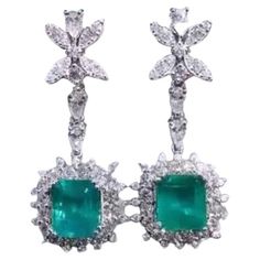 A pair of Emeralds and Diamonds , an exquisite display of elegance. This stunning combination creates a captivating piece that enhances any ensemble with its luxurious and sophisticated allure. Adds a touch of elegance and class on your look. Magnificent earring come in 18k gold with two pieces of Natural Zambian Emeralds, fine quality, vibrant color, in perfect cut, of 9,00 carats, and 98 pieces of Natural Diamonds, of 4,00 carats, F color VS clarity, very sparkly. Handcrafted by artisan goldsmith. Extremely high product. Shop with Confidence. We offer worldwide shipping , taxes free on my shipment. 18k Gold Earrings, Zambian Emerald, Rock Stars, Dream Jewelry, Chandelier Earrings, Two Pieces, Natural Diamonds, Gemstone Jewelry, Gold Earrings