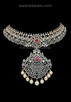 18 karat white & yellow gold polish 'detachable - 10 in 1' diamond choker necklace with color stones & south sea pearls
  this product has a detachable pendant which can be used as a separate pendant with most chains
  length of the pendant : 3.35 inches
  width of the pendant : 2.20 inches  
  this is a 10-in-1 diamond choker necklace
  1. it can be used as a 3 layer choker or
  2. it can be used as a 2 layer choker using the top 2 layers or
  3. it can be used as a 2 layer necklace using the b 2 Layer Necklace, Detachable Pendant, Diamond Choker Necklace, Layered Chokers, Diamond Choker, Color Stones, Layer Necklace, South Seas, South Sea Pearls