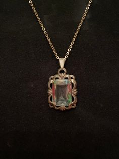 Vintage Iris Watermelon stone necklace. Beautiful colors of pink, green and blue. Pendant 1 inch length  3/4 in width, silver chain.  In good condition. Please zoom in on  Pictures and ask any questions.  No returns. Thanks Watermelon Stone, Crystal Necklaces, Blue Pendant, Vintage Lucite, Cute Purses, Gorgeous Bags, Vintage Copper, Green And Blue, Stone Necklace