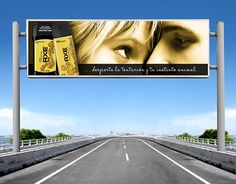 an advertisement for deodorant on the side of a road with a woman's face